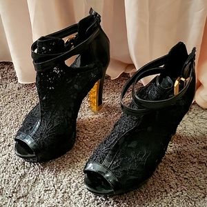 Black and gold heels